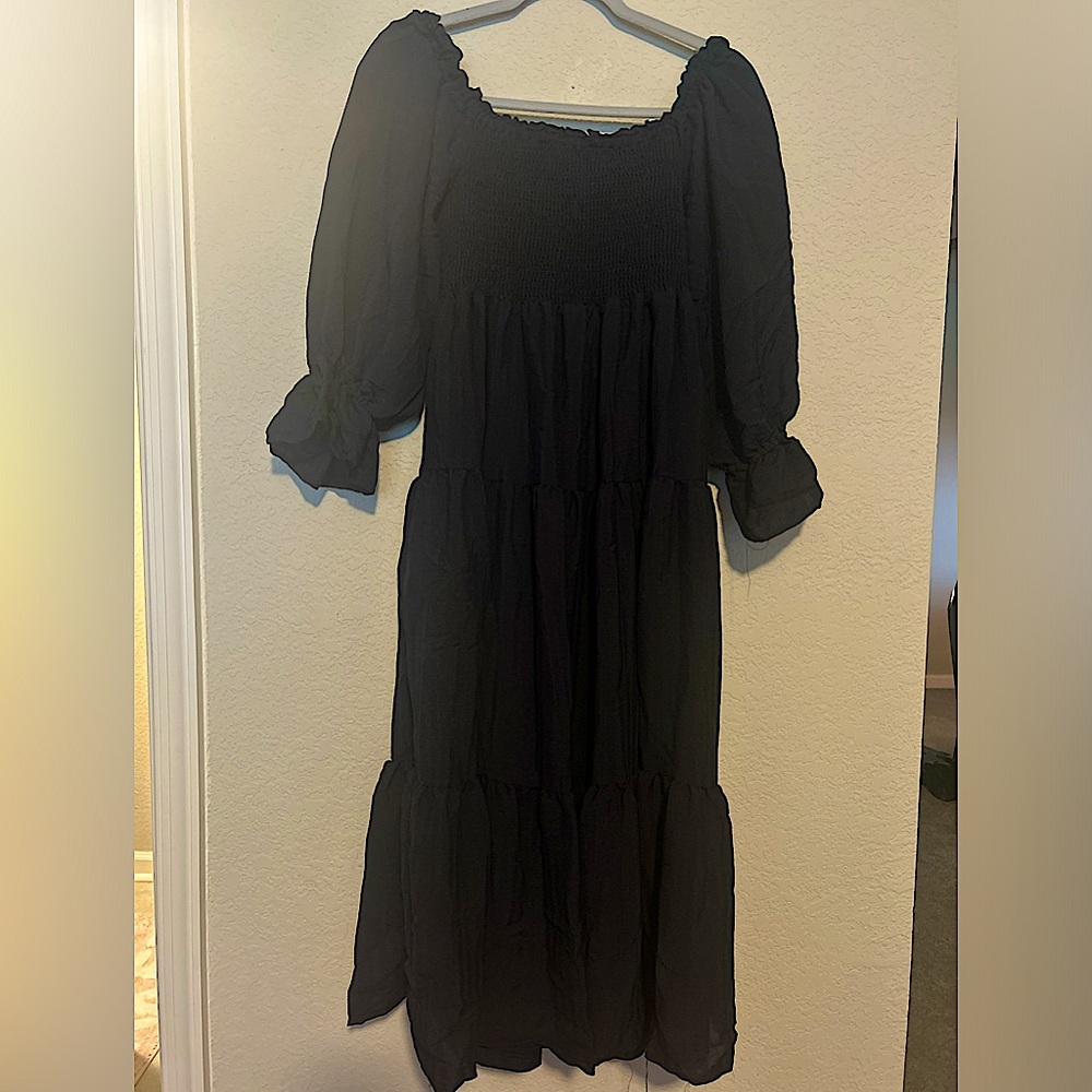 Navy blue dress size medium purchased from VICI